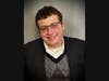 Bennett Davishoff of Deerfield plays the Radio Announcer in Six Stories Up in the Roaring 20's