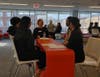 Deana Hans of United Express, guided ASPIRA  seniors through mock job interviews at the ASPIRA Business and Finance High School event.