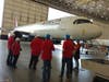 A Delta Airlines TechOPS team member explains the extent of their work to Project AMPLiFI students.