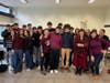 Liceo Morgagni students with Prof. Carnini Pulino of Rome's John Cabot University (second from R) who was the mentor volunteer for the Netflix case and Mentoring Mission's Carol Valentino Barry (center, L) and classroom teacher Eleanora Mori (far R)