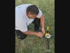 ACE Academy student Mark Thompson prepares a model rocket for launch during a hands-on aerospace activity.