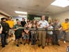 Wheaton Mayor Phil Suess and DoodleBug Workshop executive director Sarah Starke plus participants and supporters cut the ribbon at the Adult Day Program space.