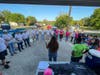 Volunteers gather for last minute instructions