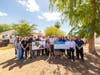 AutoNation Subaru Scottsdale executives are joined by executives from Subaru for the presentation of a $120,000 donation to AZAFAP