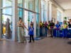 Wish Kid Elsa, a 7-year-old pediatric cancer patient, and her mother enter the AutoNation Subaru Scottsdale store for a camping-themed celebration