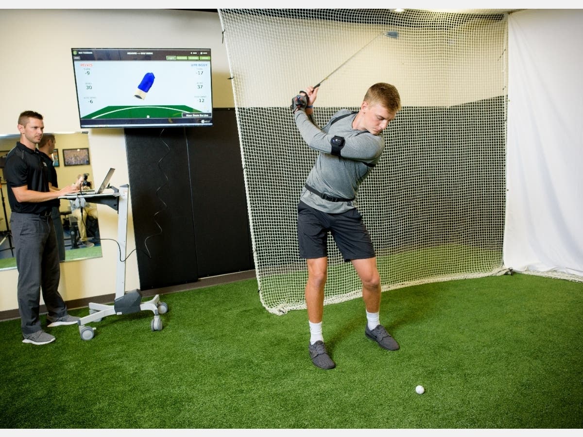 Prior to social distancing recommendations, Mark Demchak, ATC, conducts a biomechanical analysis of a golf swing at the Northwestern Medicine Golf Performance Academy in Warrenville. 