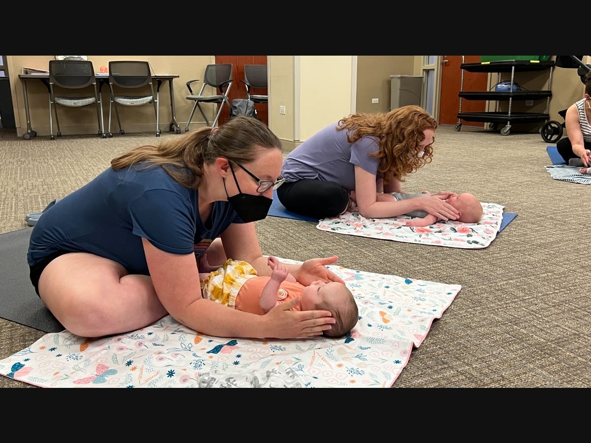 Baby Yoga teaches parents positive touch and movement.