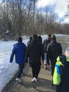Students in the final mile of a 13-mile walk from Evanston to Highland Park as part of the 2019 HPHS Charity Drive.