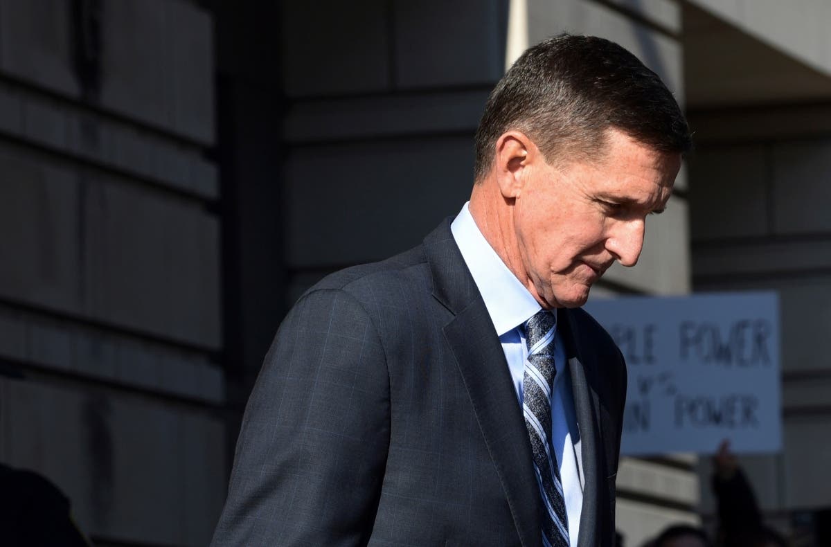 Ex-National Security Adviser Michael Flynn leaves court in Washington on Dec. 1, 2017 after pleading guilty to a felony.