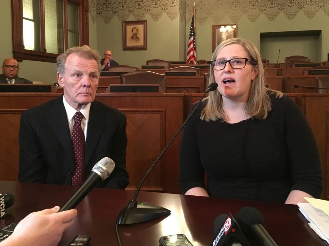 House Speaker Michael Madigan, left, appears with the attorney for his political committee, Heather Wier Vaught, right.