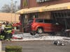 A van crashed into a McDonald's on Howard Street Thursday morning.