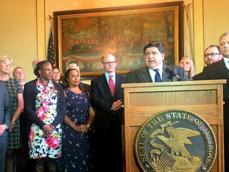 Gov. JB Pritzker and Democratic state legislators praised the passage of SJRCA 1 on May 27, 2019.