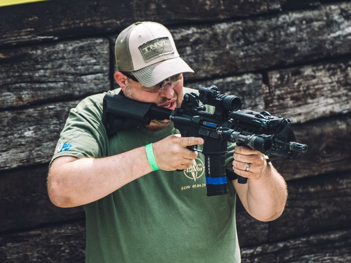 Deerfield resident Daniel Easterday challenged the village's ban on firearms like the one he is pictured shooting.