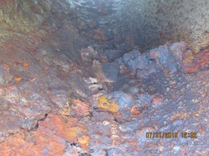 An image of "Black Crust" from a 2017 preliminary risk assessment completed by environmental consultants for the city.