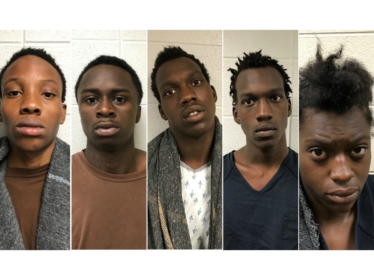 Prosecutors agreed to drop first-degree murder charges against, from left, Kendrick Cooper, 17, Curtis Dawson, 16, Stacey Davis, 17, Steven Davis, 17, and Diamond Davis, 18.