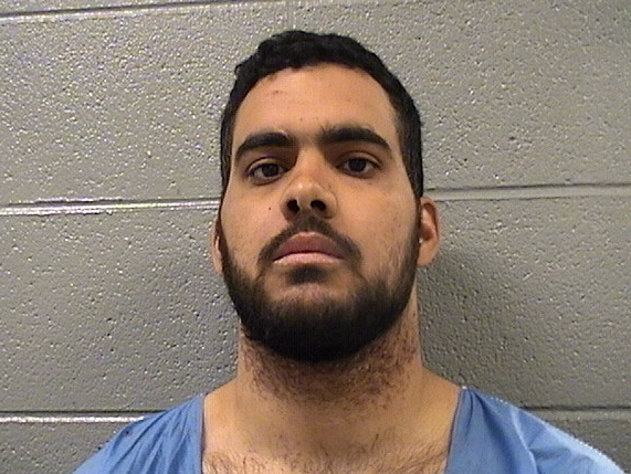 Zachary S. Spear, 28, is being held on multiple charges at the Cook County Jail following his arrest last week at St. Francis Hospital in Evanston.