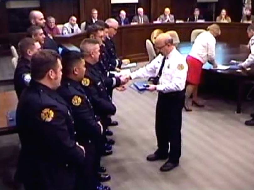 Winnetka Fire Chief Alan Berkowsky ​recognizes first responders at a Nov. 5, 2019, village council meeting for helping rescue a patient who suffered a cardiac arrest in September in Kenilworth.