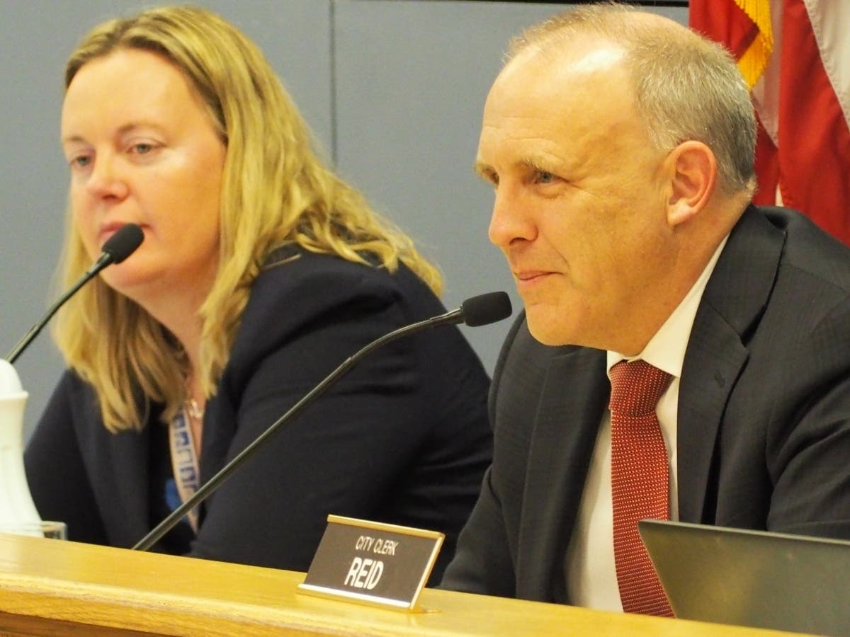 Mayor Steve Hagerty, at right, requested a closed-door discussion with the head of the public sector executive search firm GovHR to discuss the search for a new city manager at a Jan. 27, 2020, meeting, but some aldermen called for a public discussion.