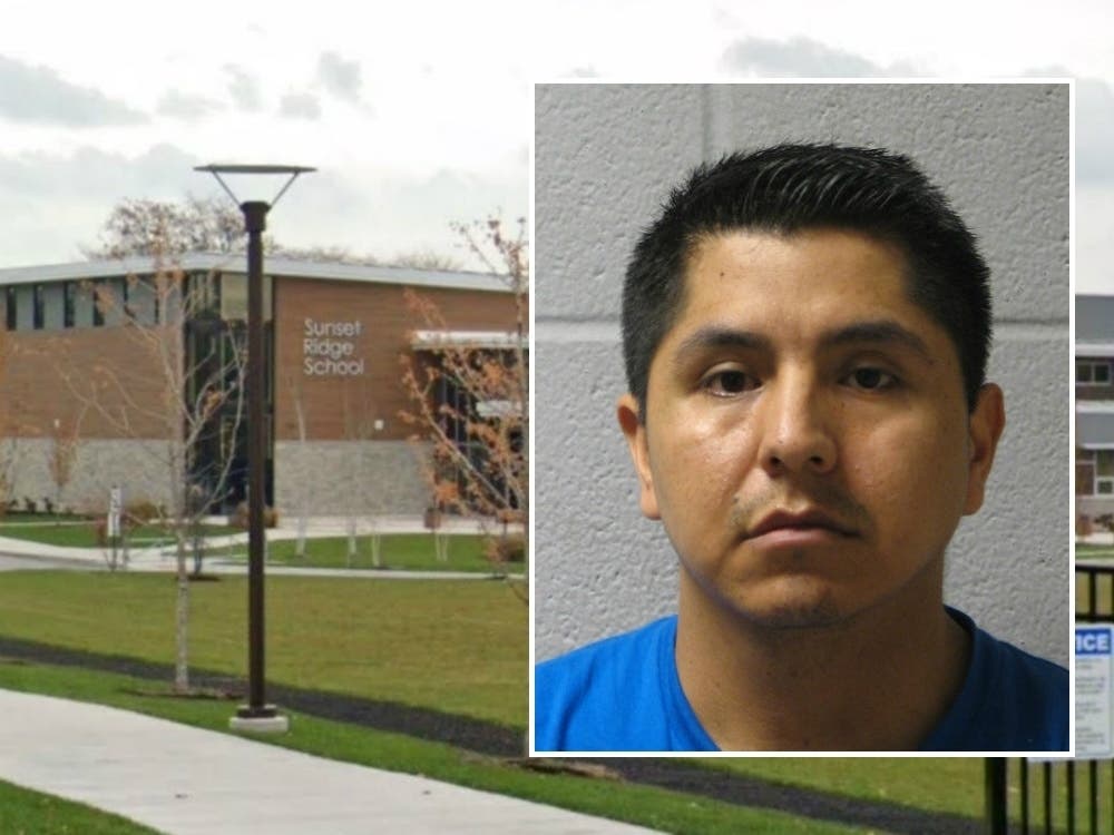David Garcia-Espinal, of HIghwood, wanted on a warrant in connection with the discovery of a hidden camera in the staff bathroom of Sunset Ridge School, was accused in 2012 of public indecency in the women's room of a Glenview movie theater, records show.