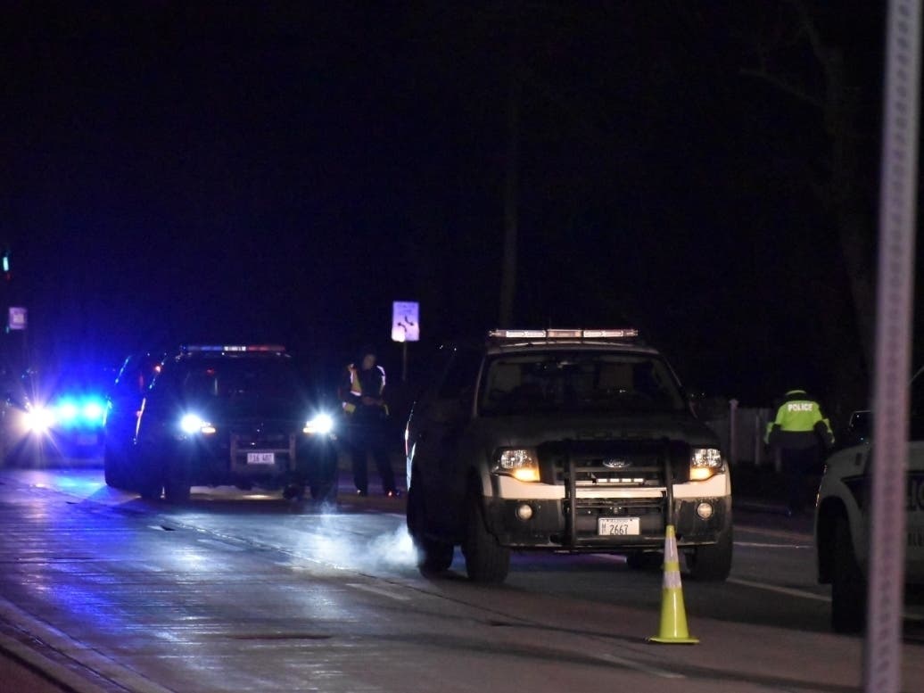 Members of the Lake County Major Crash Assistance Team investigate the scene of a hit-and-run incident at Deerfield Road and Beverly Place on Feb. 7, 2020. 
