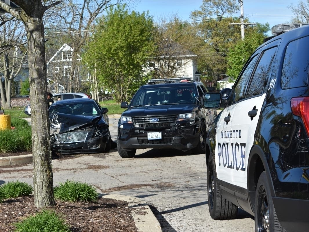 A 48-year-old Evanston man on parole was arrested following several traffic crashes involving a stolen Cadillac Wednesday afternoon in Wilmette.
