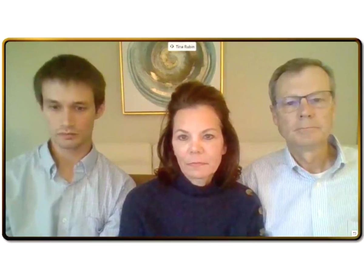 Tim Kater (left) joins Tina and Bob Rubin of Bloomington in a remote appearance at Gov. J.B. Pritzker's news conference Friday in Chicago.