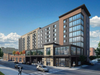 A rendering shows a potential future residential development on the east side of a planned Homewood Suites by Hilton hotel at Oakton Street and Niles Avenue.