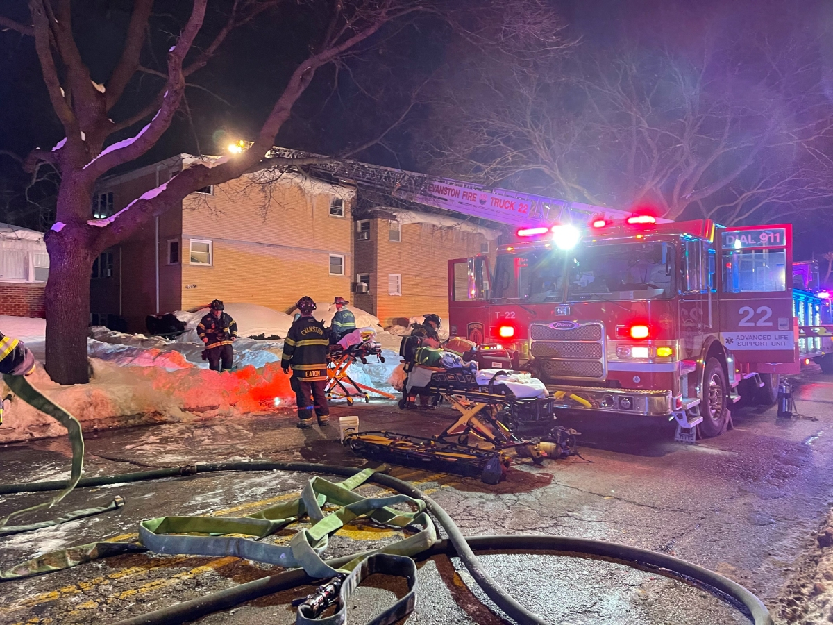 Firefighters contained an apartment building blaze to a second-floor kitchen area Friday night. The structure was saved but 11 residents were displaced, according to fire officials.