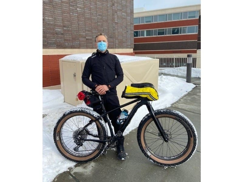 Dr. John Spehlmann is pictured with one of four pairs of bicycle lockers installed at Northwestern Medicine Lake Forest Hospital in January.