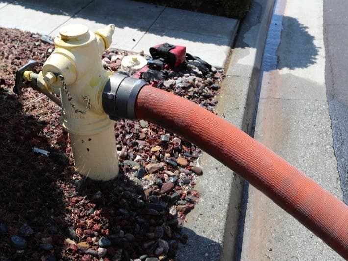 Under a new 20-year contract, Skokie's initial wholesale purchase rate to Evanston will be $1.26 per 1,000 gallons, far less than the $2.06 per 1,000 gallons price sought by the city.