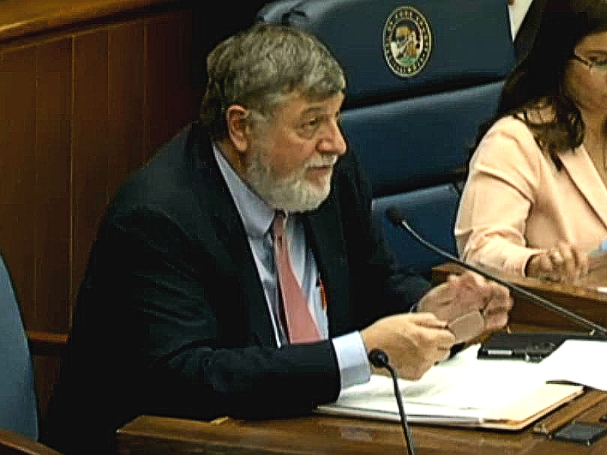 Cook County Commissioner Larry Suffredin says he will refrain from supporting a successor to his seat. 