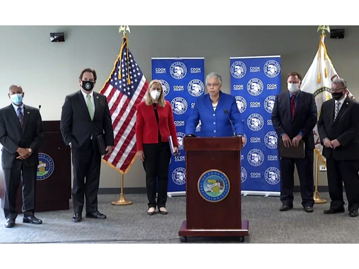 From left: Hazel Crest Village President Vernard Alsberry, Geneva Mayor Kevin Burns, Highland Park Mayor Nancy Rotering, Cook County Board President Toni Preckwinkle, Palos Park Mayor John Mahoney and Darien Mayor Joe Marchese, spoke to media Wednesday.