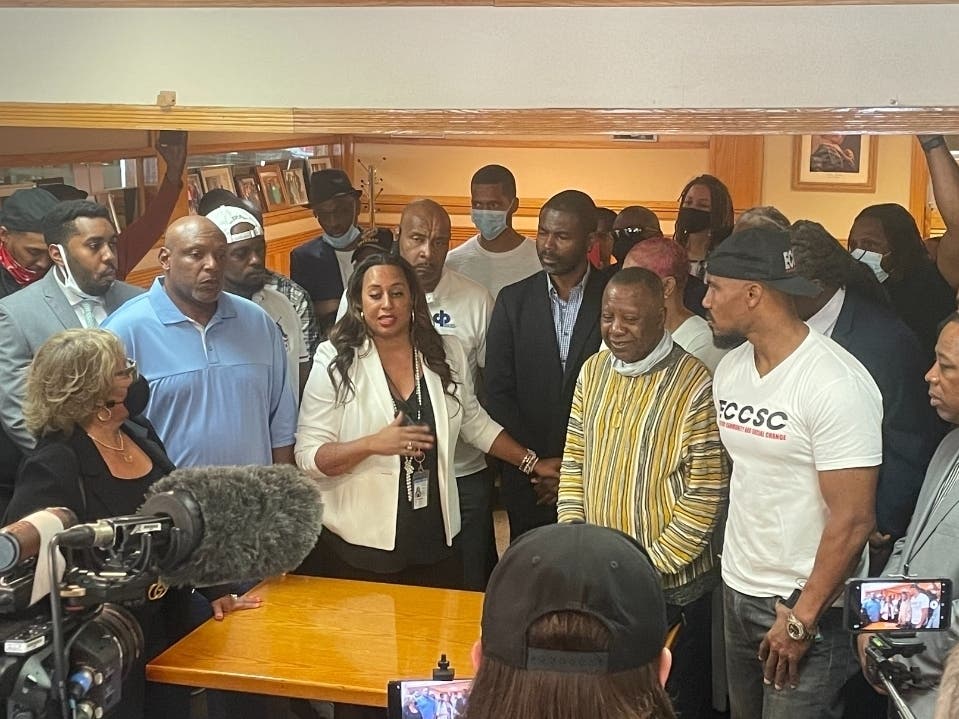 Toi Hutchinson, at center left, appeared with Douglas Kelly, at left, of the Cannabis Equity Illinois Coalition, State Rep. LaShawn Ford, at center, Rickey Hendon, right center, and Tyrone Muhammed, right, of Ex-Cons for Community and Social Change.