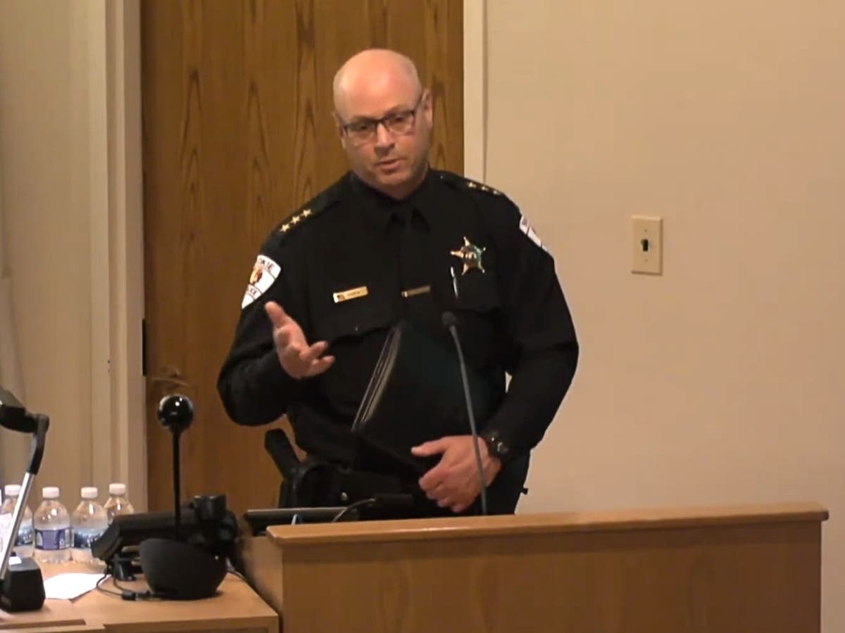 Skokie Police Chief Brian Baker addresses trustees at Wednesday's village board meeting. 