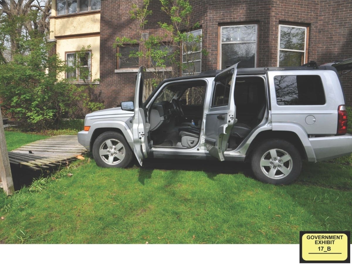 Two men were arrested after a Jeep crashed into a fence in the front yard of a home at the corner of Lincoln Street and Sherman Avenue on May 8, 2019.
