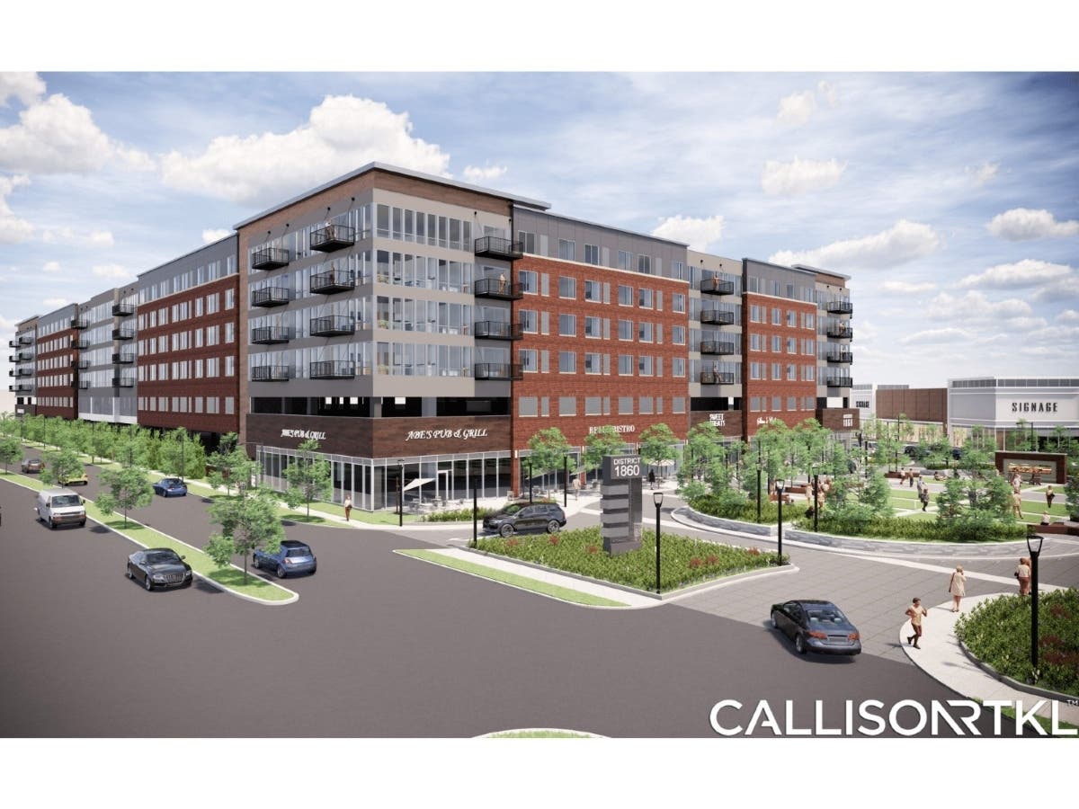 A rendering shows plans for redevelopment of the 8.5-acre former Purple Hotel site, which is due to include an Amazon Fresh grocery story and nearly 300 apartments.