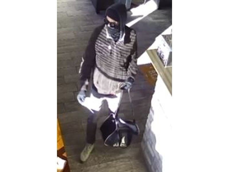 Police said an armed man robbed a video gambling cafe in Niles on Sunday morning.