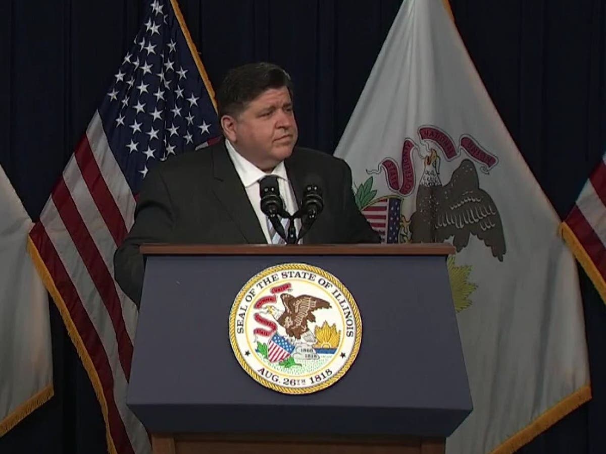 Gov. J.B. Pritzker told reporters Wednesday that Illinois health care systems are still strained by the number of people with COVID-19 in hospitals.