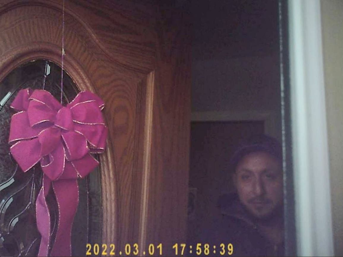 Federal authorities said this image, captured from a video recorded by a confidential source, shows Gilberto Almanza at his North Chicago home during a March 17 narcotics transaction.