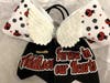 The hair bow worn by the team, honoring Co-Coach Erin Locke's daughter Addison, who passed away seven years ago