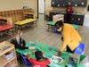 Troy 30-C preschool teacher Kelly Forney and aide Rita Thompson, with Director of Early Childhood Education Pamela Maxey, work with a student in one of the district’s new preschool classrooms, developed from remodeled space at Troy Cronin Elementary