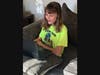 Annaiyeh Deltoro-Parlich, who is in a Troy 30-C choir, works on her music assignment from home.