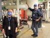 Kerry Rivecco and Bob Whaley, with Troy’s Facilities and Operations Department, help keep Troy schools running.