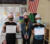 Students in Catherine Smith's 4th grade classroom at Troy Heritage Trail Elementary School observed Veterans Day by writing letters of appreciation to veterans and making hats featuring the different branches of the service.