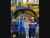 Troy Shorewood Elementary School students Cullen, Dylan, Patrick, Cameron, Burke-Diamond and Angel enjoy Career Day on a grinder dozer.