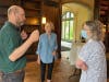 Keith McClow, heritage experience manager at the DuPage Forest Preserve District, talks to visitors during a tour of Mayslake as part of the kickoff event for the Mayslake restoration project.