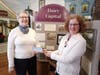 DAR member Jackie Marcus (left) with Beth Nawara, Curator at Elgin History Museum. The donation from Signal Hill Chapter, NSDAR, will go toward the restoration of a full-sized dairy wagon. The Elgin area was once known for its dairy farms.