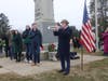 Bugler Jackson Summerfield with local dignitaries and attendees
