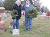 Volunteers placing wreaths