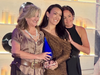 Executive Director Janet Hamada-Kelley (center) presented iHeartMedia's Jillian Muschell (left) and Emily Griffiths (right) with the 2026 Visionary Award for their support in amplifying awareness and elevating the conversation around Alzheimer's disease.
